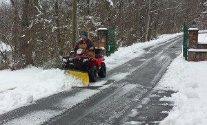 Smoky Mt Golden Cabins plowing snow!